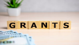 The word of GRANTS on building blocks concept.